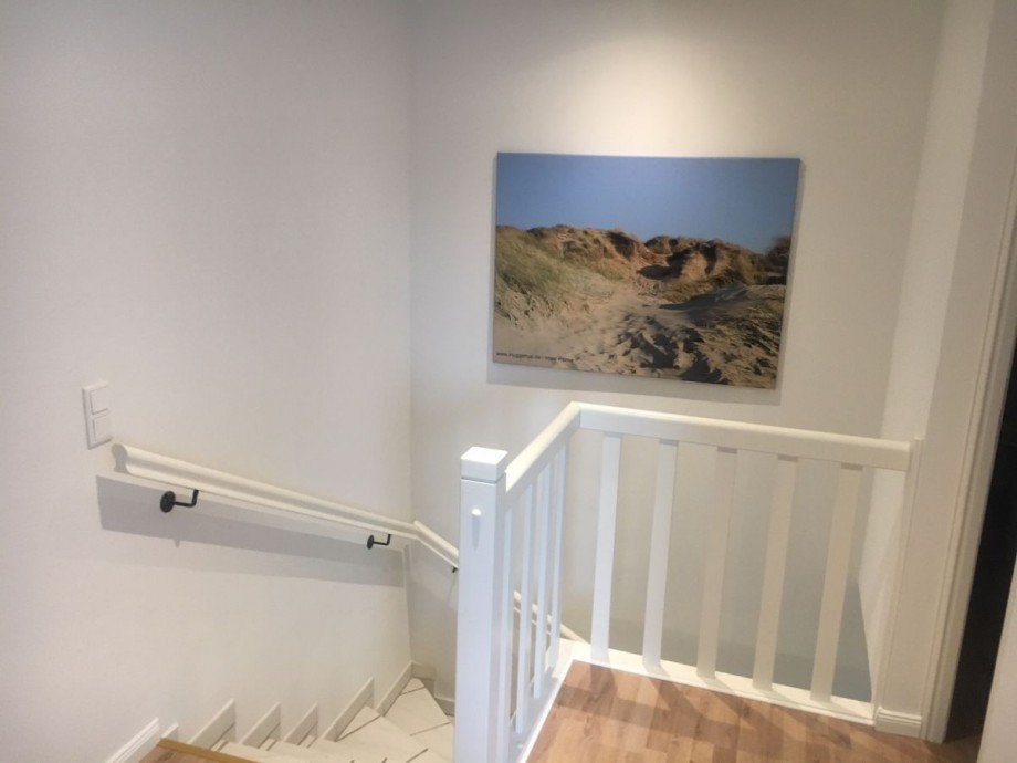 Treppe ins OG Reihenmittelhaus Ferienhaus in Nordfriesland Verkauf provisionsfrei